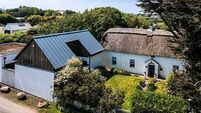 Two homes for the price of one: Thatched cottage and bungalow on sale together Two homes for the price of one: Thatched cottage and bungalow on sale together