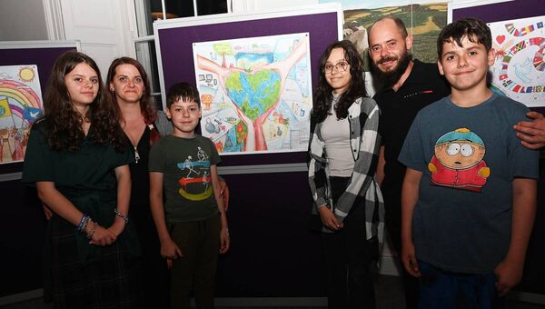 Beatrice Caraene artist with her family Beatrice Caraene artist with her family