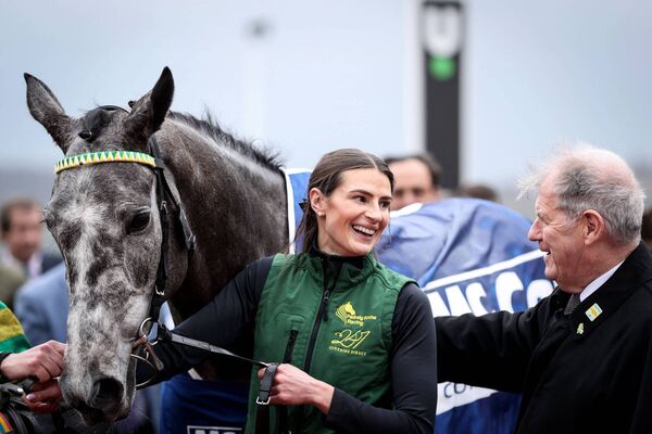 Owner JP McManus has a word of congratulations for groom Katie Young after Saratoga's success Photo: ©INPHO/Tom Maher Owner JP McManus has a word of congratulations for groom Katie Young after Saratoga's success Photo: ©INPHO/Tom Maher