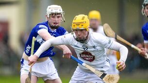 <p>Kildare's Oisin McAffee in action is tackled by Dan Bowe of Laois Photo: James Lawlor</p> <p>Kildare's Oisin McAffee in action is tackled by Dan Bowe of Laois Photo: James Lawlor</p>